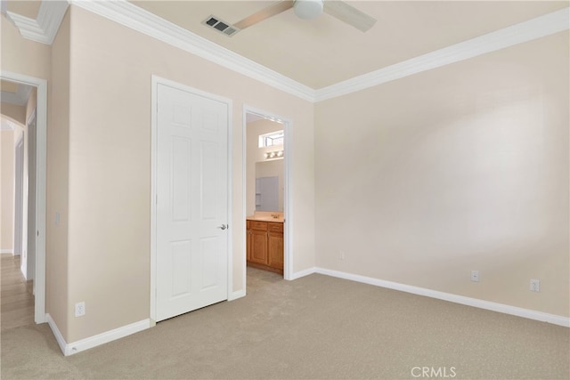 19570 Vermillion Ln, Apple Valley, CA 92308 - unfurnished bedroom featuring light colored carpet, crown molding, ensuite bathroom, and ceiling fan