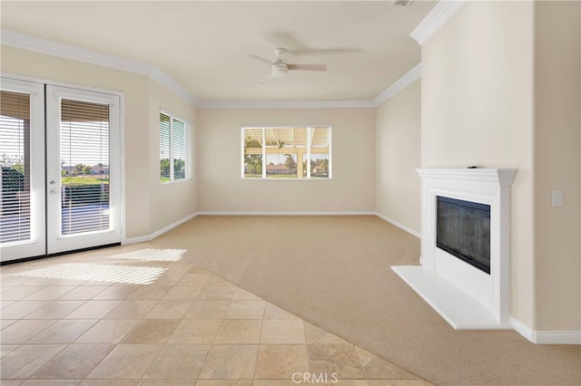 19570 Vermillion Ln, Apple Valley, CA 92308 - unfurnished living room with light carpet, ornamental molding, ceiling fan, french doors, and a glass covered fireplace