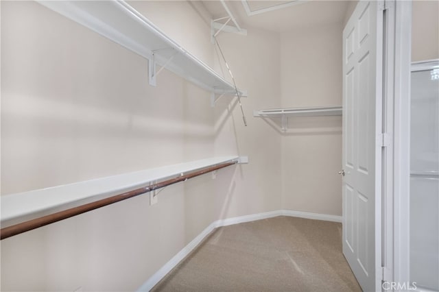 19570 Vermillion Ln, Apple Valley, CA 92308 - walk in closet featuring light carpet