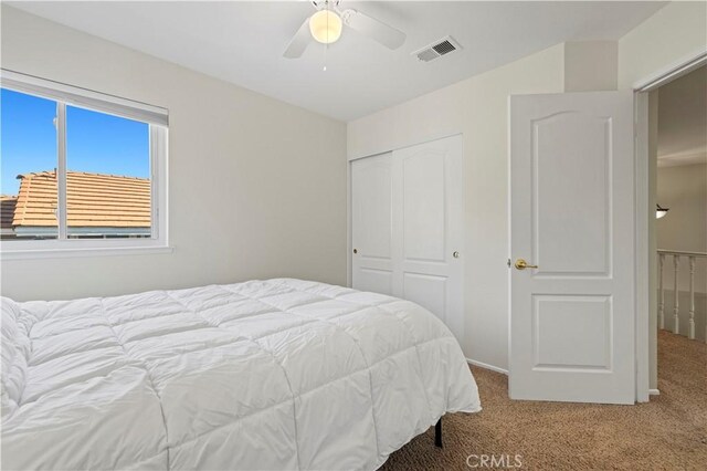 28610 Cloverleaf Pl, Castaic, CA 91384 - bedroom with carpet, a closet, and a ceiling fan