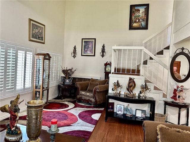 3210 S Center St, Santa Ana, CA 92704 - living area featuring a high ceiling, stairway, and wood finished floors