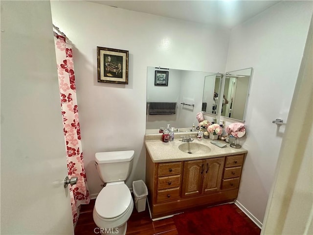 3210 S Center St, Santa Ana, CA 92704 - bathroom with wood finished floors, vanity, and curtained shower