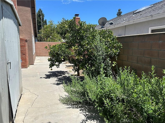 3210 S Center St, Santa Ana, CA 92704 - fenced backyard with a patio area