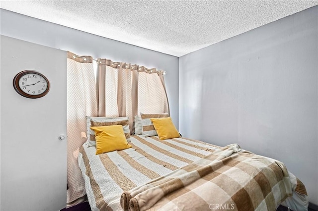 5535 Ackerfield Ave Unit 47, Long Beach, CA 90805 - carpeted bedroom featuring a textured ceiling