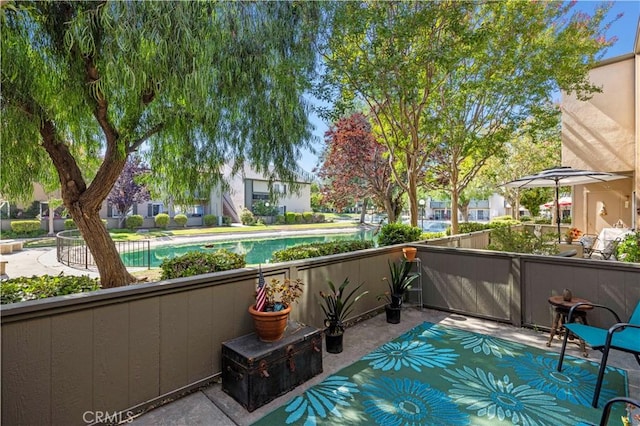 25735 Hogan Dr Unit E11, Valencia, CA 91355 - balcony with view of pool area