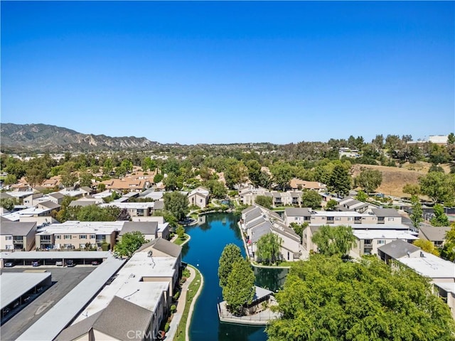 25735 Hogan Dr Unit E11, Valencia, CA 91355 - aerial perspective of suburban area with a water and mountain view