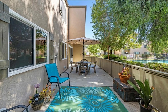 25735 Hogan Dr Unit E11, Valencia, CA 91355 - view of patio featuring outdoor dining space