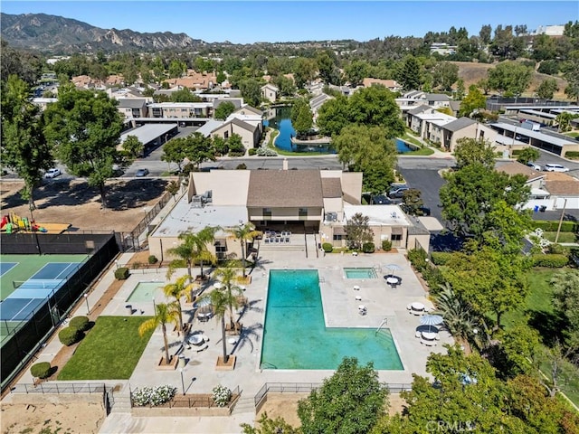 25735 Hogan Dr Unit E11, Valencia, CA 91355 - aerial view of residential area featuring a pool and a mountain backdrop