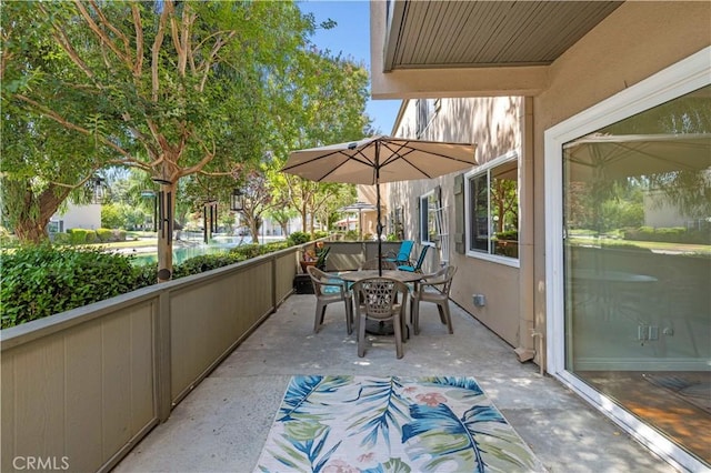 25735 Hogan Dr Unit E11, Valencia, CA 91355 - view of patio with outdoor dining space