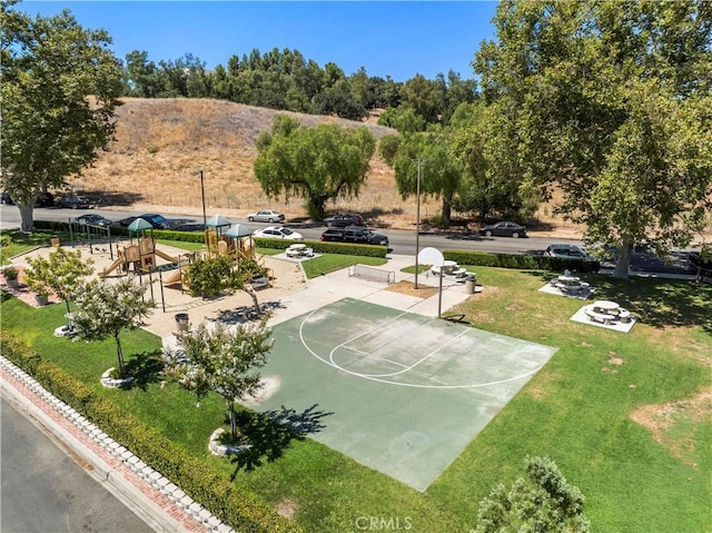 25735 Hogan Dr Unit E11, Valencia, CA 91355 - view of sport court with community basketball court and a lawn