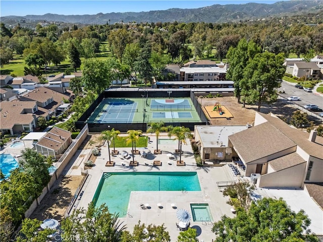 25735 Hogan Dr Unit E11, Valencia, CA 91355 - drone / aerial view of a pool area and mountains