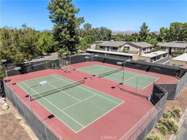 25735 Hogan Dr Unit E11, Valencia, CA 91355 - view of tennis court with a mountain view and community basketball court