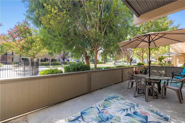 25735 Hogan Dr Unit E11, Valencia, CA 91355 - view of patio / terrace featuring outdoor dining area