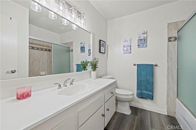 25735 Hogan Dr Unit E11, Valencia, CA 91355 - full bathroom with vanity, wood finished floors, and shower / bath combination with glass door