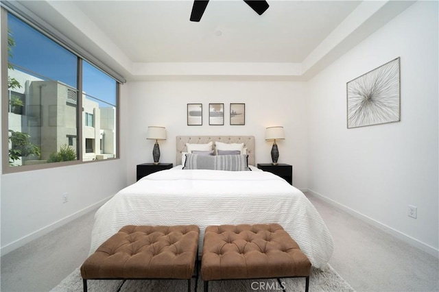 185 Magnet, Irvine, CA 92618 - carpeted bedroom featuring a raised ceiling and a ceiling fan