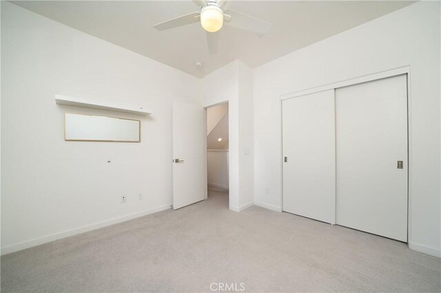 185 Magnet, Irvine, CA 92618 - unfurnished bedroom with light carpet, a closet, and ceiling fan