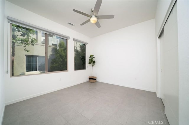 185 Magnet, Irvine, CA 92618 - empty room featuring ceiling fan and baseboards