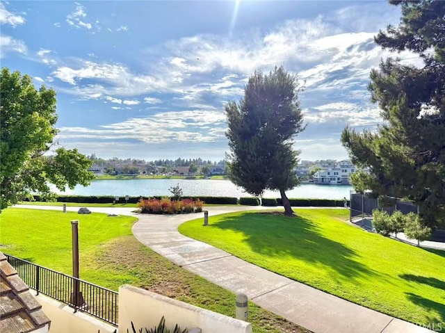 72 Coral Unit 38, Irvine, CA 92614 - view of home's community featuring a water view and a lawn