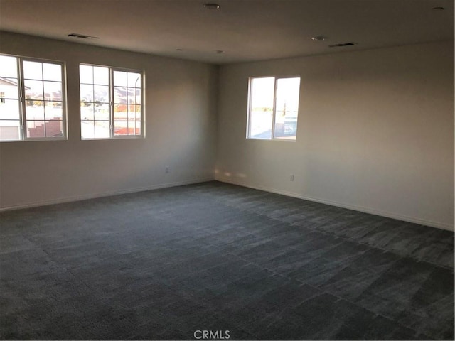 1031 Coriander St, Calimesa, CA 92320 - unfurnished room featuring dark carpet and baseboards