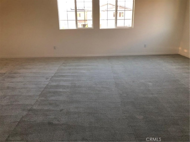 1031 Coriander St, Calimesa, CA 92320 - carpeted empty room featuring baseboards