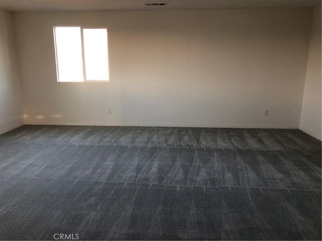 1031 Coriander St, Calimesa, CA 92320 - unfurnished room with dark colored carpet and baseboards