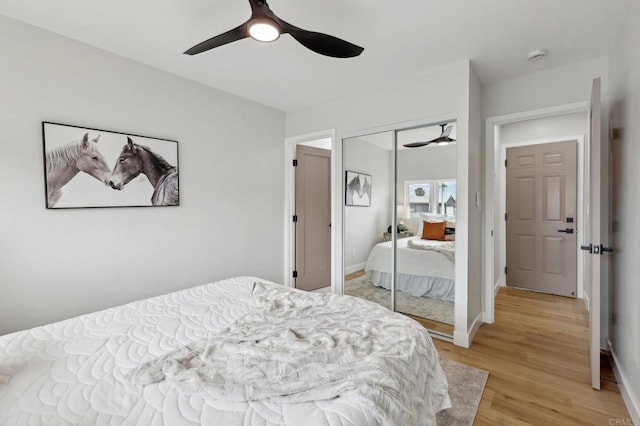 3821 Shiloh Rd, San Diego, CA 92105 - bedroom with light wood-style flooring, a closet, and a ceiling fan