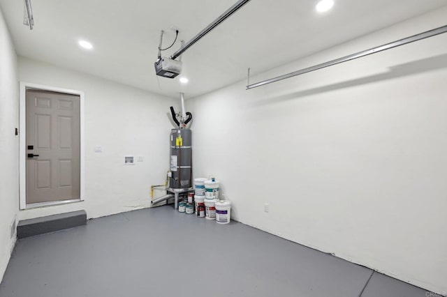3821 Shiloh Rd, San Diego, CA 92105 - garage with a garage door opener, secured water heater, and recessed lighting