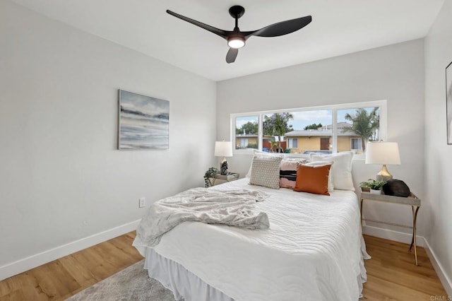 3821 Shiloh Rd, San Diego, CA 92105 - bedroom with wood finished floors and ceiling fan