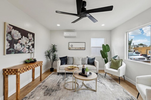 3821 Shiloh Rd, San Diego, CA 92105 - living room featuring a wall unit AC, wood finished floors, a ceiling fan, and recessed lighting