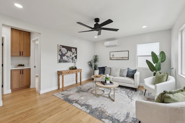 3821 Shiloh Rd, San Diego, CA 92105 - living area featuring an AC wall unit, light wood finished floors, ceiling fan, and recessed lighting