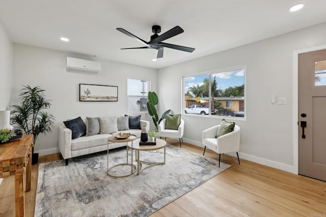 3821 Shiloh Rd, San Diego, CA 92105 - living room featuring a wall mounted AC, recessed lighting, ceiling fan, and wood finished floors