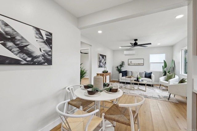 3821 Shiloh Rd, San Diego, CA 92105 - dining space featuring wood finished floors, recessed lighting, an AC wall unit, and ceiling fan