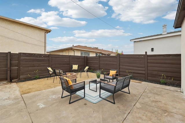 3821 Shiloh Rd, San Diego, CA 92105 - fenced backyard with a patio and an outdoor living space with a fire pit