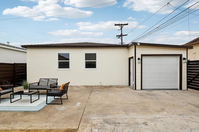 3821 Shiloh Rd, San Diego, CA 92105 - back of property featuring stucco siding and an attached garage