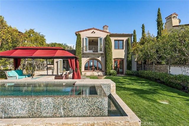 3 Coral Cay, Newport Coast, CA 92657 - back of property with a balcony, french doors, a patio area, stucco siding, and ceiling fan