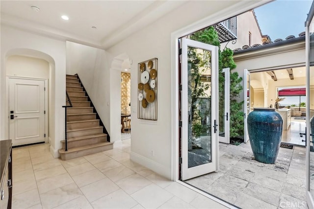 3 Coral Cay, Newport Coast, CA 92657 - doorway with stairs, arched walkways, and recessed lighting