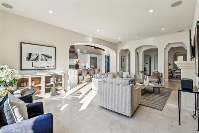 3 Coral Cay, Newport Coast, CA 92657 - living room with arched walkways and recessed lighting