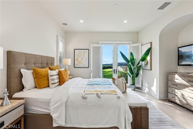 3 Coral Cay, Newport Coast, CA 92657 - bedroom featuring access to outside, recessed lighting, and wood finished floors