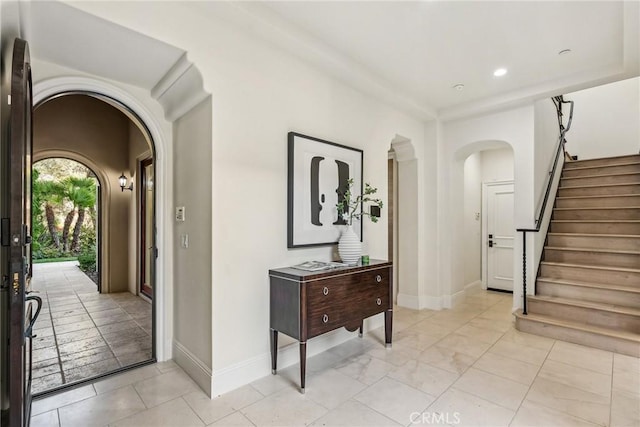 3 Coral Cay, Newport Coast, CA 92657 - entryway with arched walkways, stairway, and recessed lighting