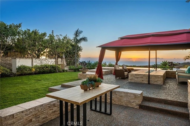 3 Coral Cay, Newport Coast, CA 92657 - patio terrace at dusk with a patio, an outdoor living space, a yard, and a gazebo