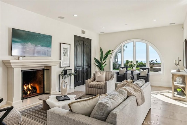 3 Coral Cay, Newport Coast, CA 92657 - tiled living area featuring recessed lighting and a lit fireplace