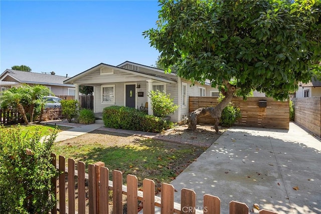 124 N Princeton Ave, Fullerton, CA 92831 - view of front of home featuring a fenced front yard and a porch