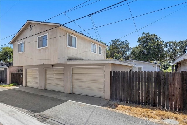 124 N Princeton Ave, Fullerton, CA 92831 - view of home's exterior with a garage