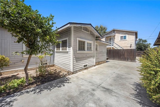 124 N Princeton Ave, Fullerton, CA 92831 - view of side of home featuring a patio area