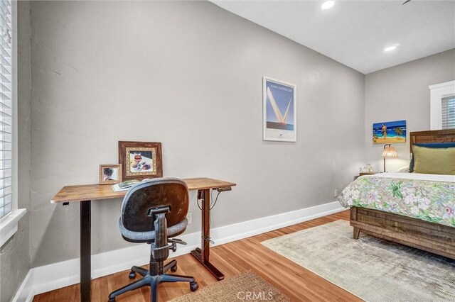 1616 E Ocean Blvd Unit 6, Long Beach, CA 90802 - bedroom with wood finished floors, recessed lighting, and a desk