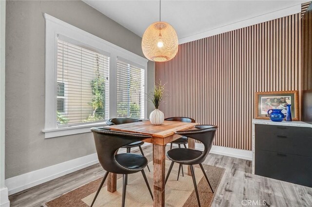 1616 E Ocean Blvd Unit 6, Long Beach, CA 90802 - dining room featuring light wood-style flooring and baseboards