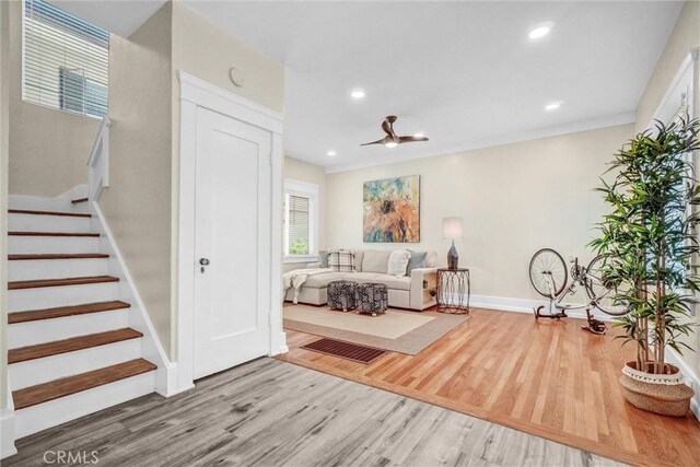 1616 E Ocean Blvd Unit 6, Long Beach, CA 90802 - foyer featuring wood finished floors, stairway, recessed lighting, and a ceiling fan