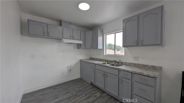 9614 Graham Ave, Los Angeles, CA 90002 - kitchen with gray cabinets and dark wood-type flooring