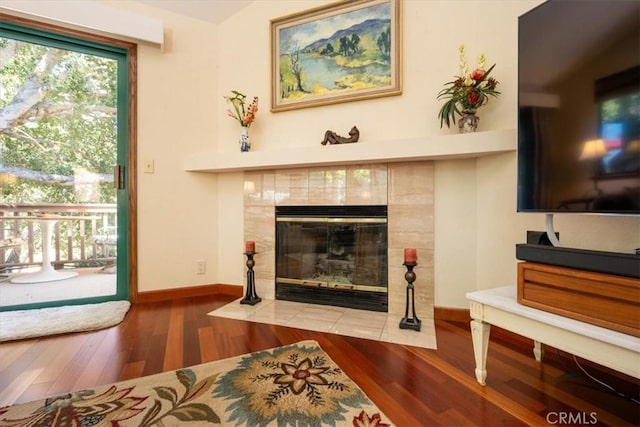 6271 Twinberry Cir Unit 6, Avila Beach, CA 93424 - living room with wood finished floors and a tiled fireplace