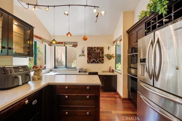6271 Twinberry Cir Unit 6, Avila Beach, CA 93424 - kitchen featuring stainless steel fridge, lofted ceiling, light countertops, dark wood-style flooring, and dark brown cabinets